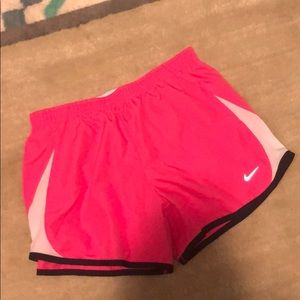 pink Nike athletic shorts